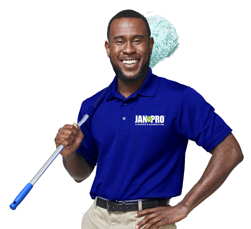 commercial cleaning expert holding a mop